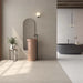Serena Mud porcelain tile floor and wall in a bathroom setting