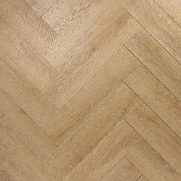Close-up herringbone pattern detail of Shannon 12mm laminate flooring
