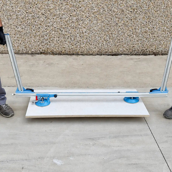 Sigma Ergo-Lift 1E used by two installers to carry a tile
