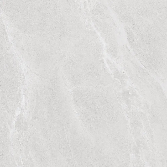 Close-up of Silea Blanco Rectified 60x60 porcelain tile with soft white stone-effect veining