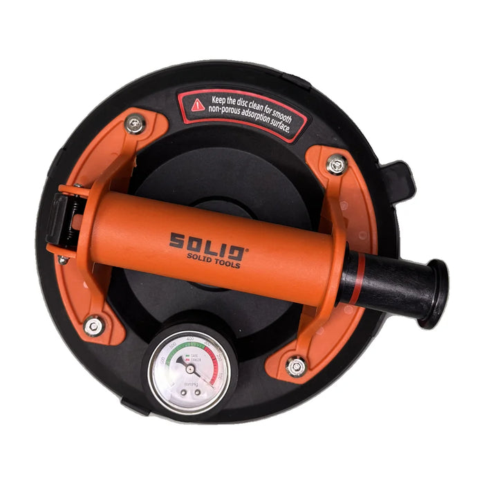 Close-up of the Solid vacuum suction cup's pump handle and pressure gauge