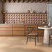 Terracota Paja porcelain tile floor in a kitchen setting with patterned backsplash tile