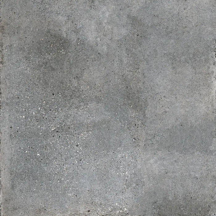 Close-up concrete-effect surface detail of Underground Graphite porcelain tile