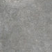 Close-up aggregate texture detail of Underground Graphite porcelain tile