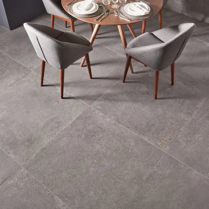 Underground Graphite porcelain tile floor in a dining room setting