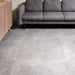 Underground Graphite porcelain tile floor in a living room setting
