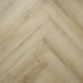 Close-up herringbone pattern detail of Vicence 12mm laminate flooring