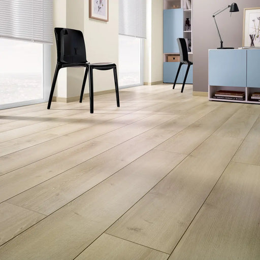 Close-up wood grain detail of Vicence 12mm laminate flooring