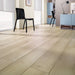 Close-up wood grain detail of Vicence 12mm laminate flooring