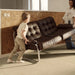Pergo Visby Midsummer Light laminate flooring in a living room with sofa