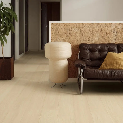 Pergo Visby Midsummer Light laminate flooring in a bright living room setting