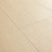 Angled close-up of Pergo Visby Beige oak laminate flooring grain and bevel
