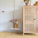 Pergo Visby Sunwash laminate flooring beside a rattan cabinet