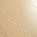 Angled close-up of Pergo Visby Sunwash oak laminate flooring grain and bevel
