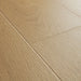 Angled close-up of Pergo Visby Blush oak laminate flooring grain and bevel