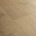 Angled close-up of Pergo Visby Driftwood Brown oak laminate flooring grain and bevel