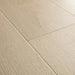 Angled close-up of Pergo Visby Light Grey oak laminate flooring grain and bevel