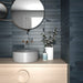 Wadi Decor Indaco patterned porcelain tile in a wide feature wall setting