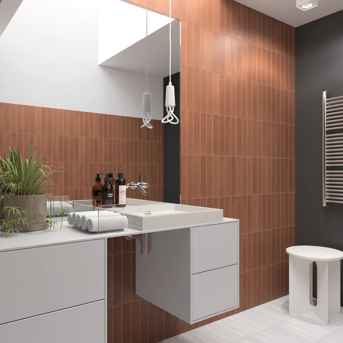 Wadi Terra matt porcelain 6x30 tile installed on a wall