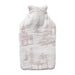 Cream knitted hot water bottle cover with a soft pink snowy village and pine tree design