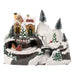 Snowy hillside Christmas scene with a yellow house, tunnels, a bridge and bottle brush trees