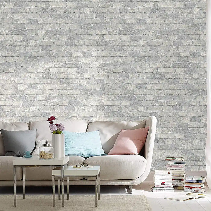 3D brick wall effect wallpaper in cream and grey