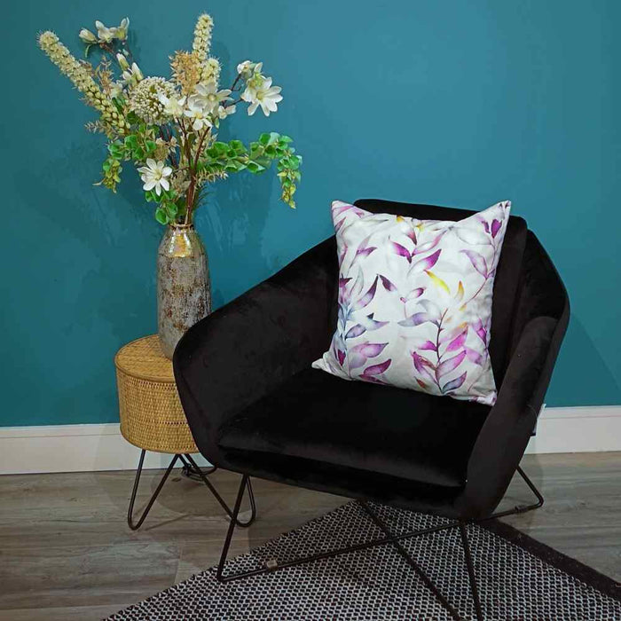 Black living room occasional chair with Ashley Wilde lavender leaves floral cushion