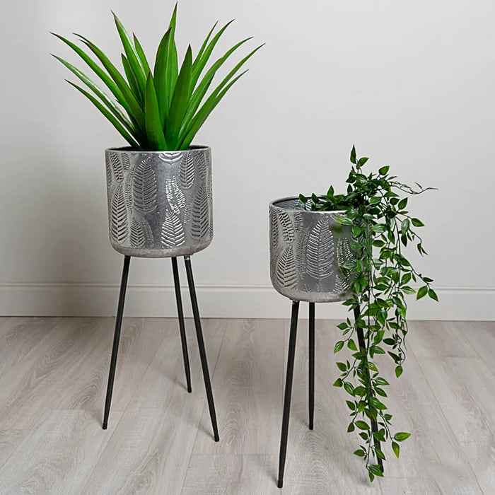 Azure sturdy tripod planters in patinated silver metal