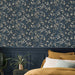 Elegant blue navy floral pattern wallpaper in a bedroom
