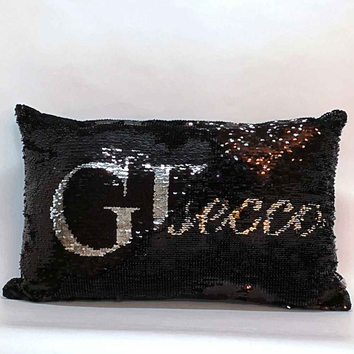 Drinkies black, silver and gold sequinned two-in-one design cushion, backed by a luxe black velvet. Brush sequins one way to say 'GIN' and the other to say 'PROSECCO'.