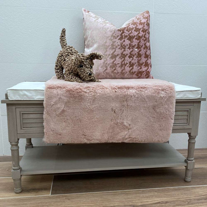 Irresistibly tactile faux sheepskin pink rug
