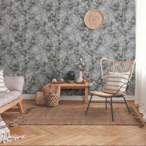 Living room with a beautiful monotone tree branch pattern wallpaper on delicate grey background