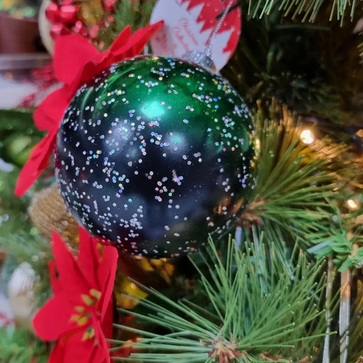 Rich, elegant green and black ombre Christmas bauble