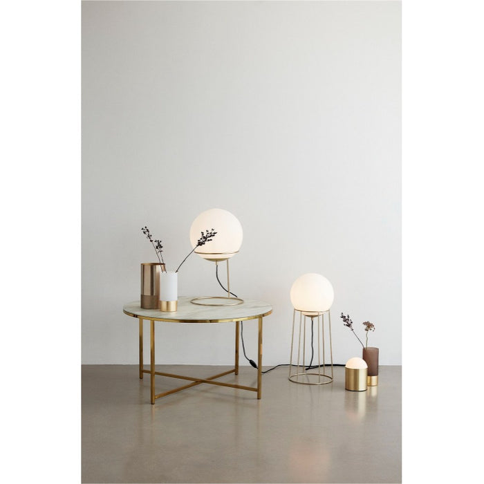 Living room setting with HUBSCH contemporary brass / iron vase