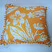 Hawaii vibrant yellow floral print cushion with pom pom edging
