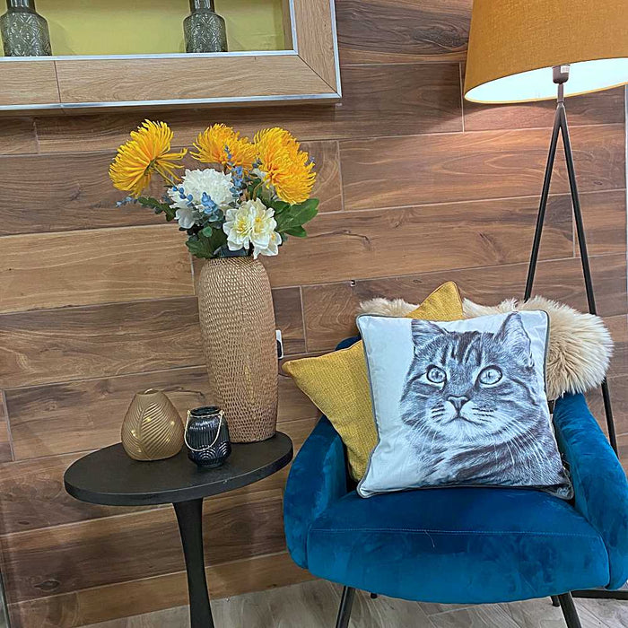 An adorable velvet print cushion with a painted cat illustration