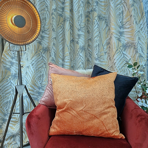 Matte cut velvet dots in a classic orange colour bingham cushion
