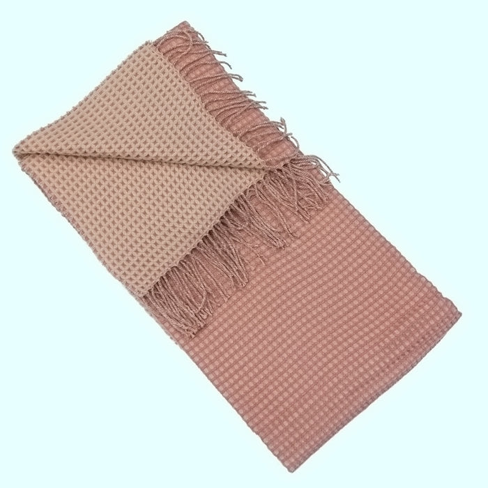 A beautiful double layered grid pattern woven Loire throw with shades of pink and fringing