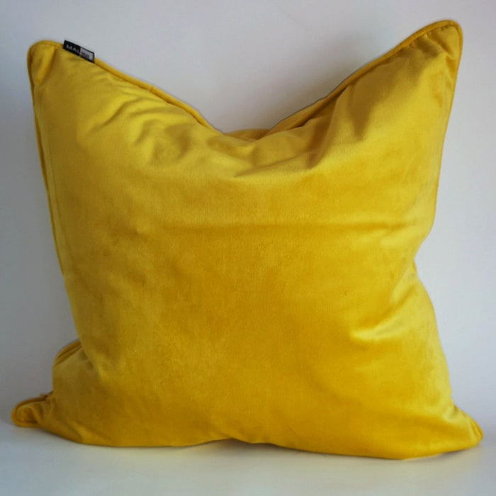 Luxe feather mustard soft matte velvet square cushion with piped-edge detailing