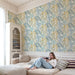 Beautiful tropical wallpaper with a light leaf motif pattern design and a variety of different leaf motifs