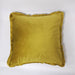 Meghan mustard soft matte velvet cushion, complete with thick fringed edges