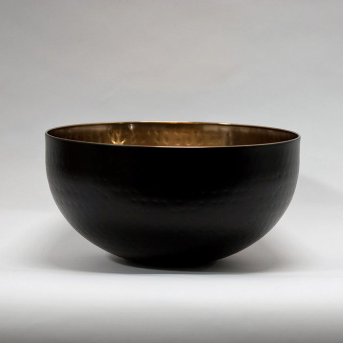 Mixology large decorative bowl featuring a combination of black and warm metallic tones