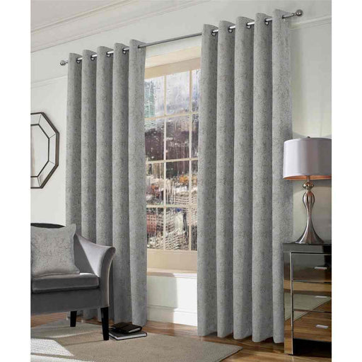 A living room window with Muse moka, geo style woven curtains