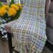 Textured woven Mustique throw with multi-coloured threads