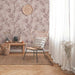 Beautiful monotone foliage on delicate pink background wallpaper in a sitting room