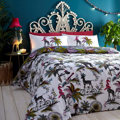 A bedroom setting with a double bed and Safari Jumble duvet set