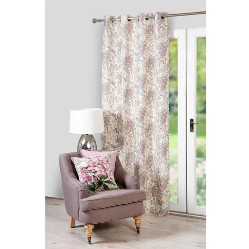 a living room window with Scatter Box Camille heather floral design curtains