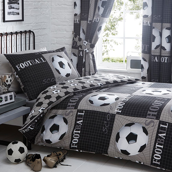 A bedroom setting with a single bed and Shoot football duvet set