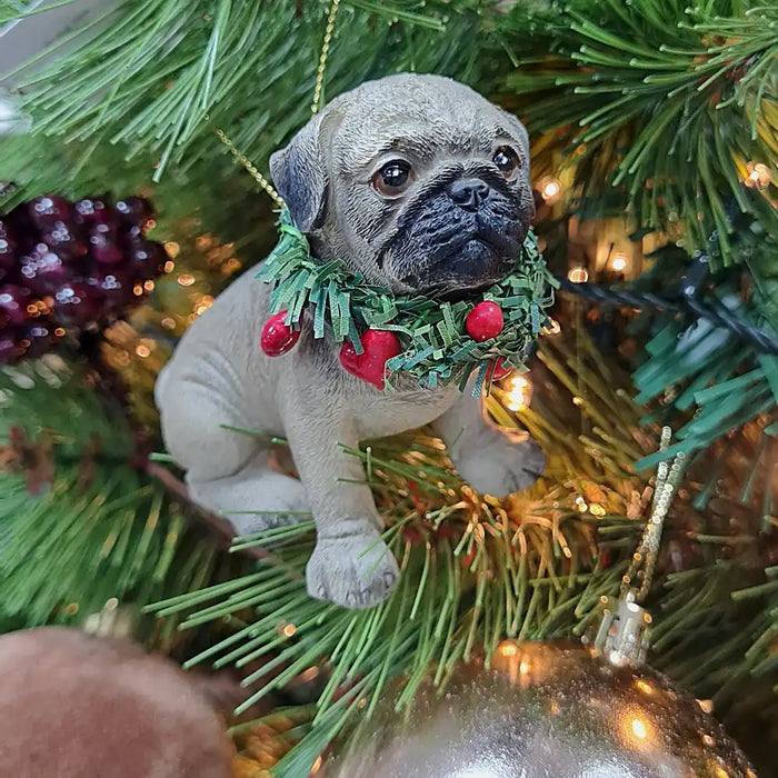 Sitting pug with Christmas wreath hanging decoration