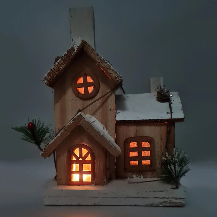 Snowy House with Light